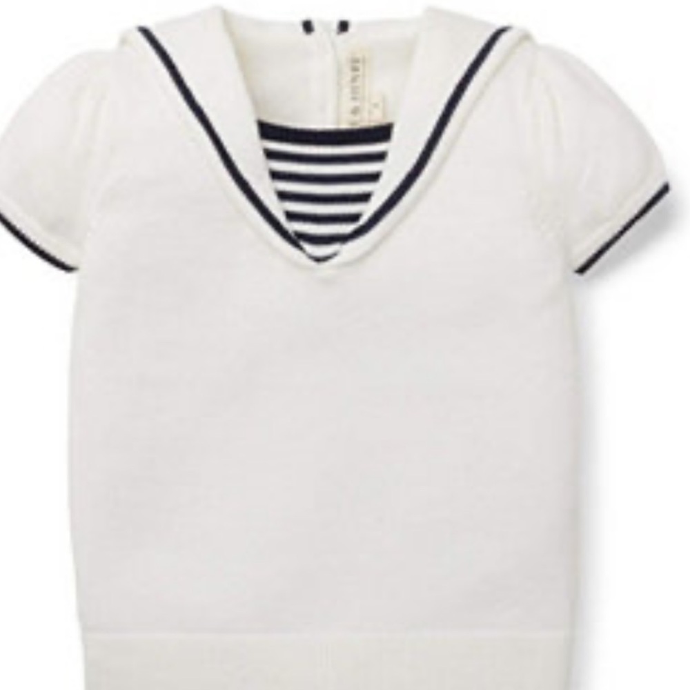 White short sleeve sweater.